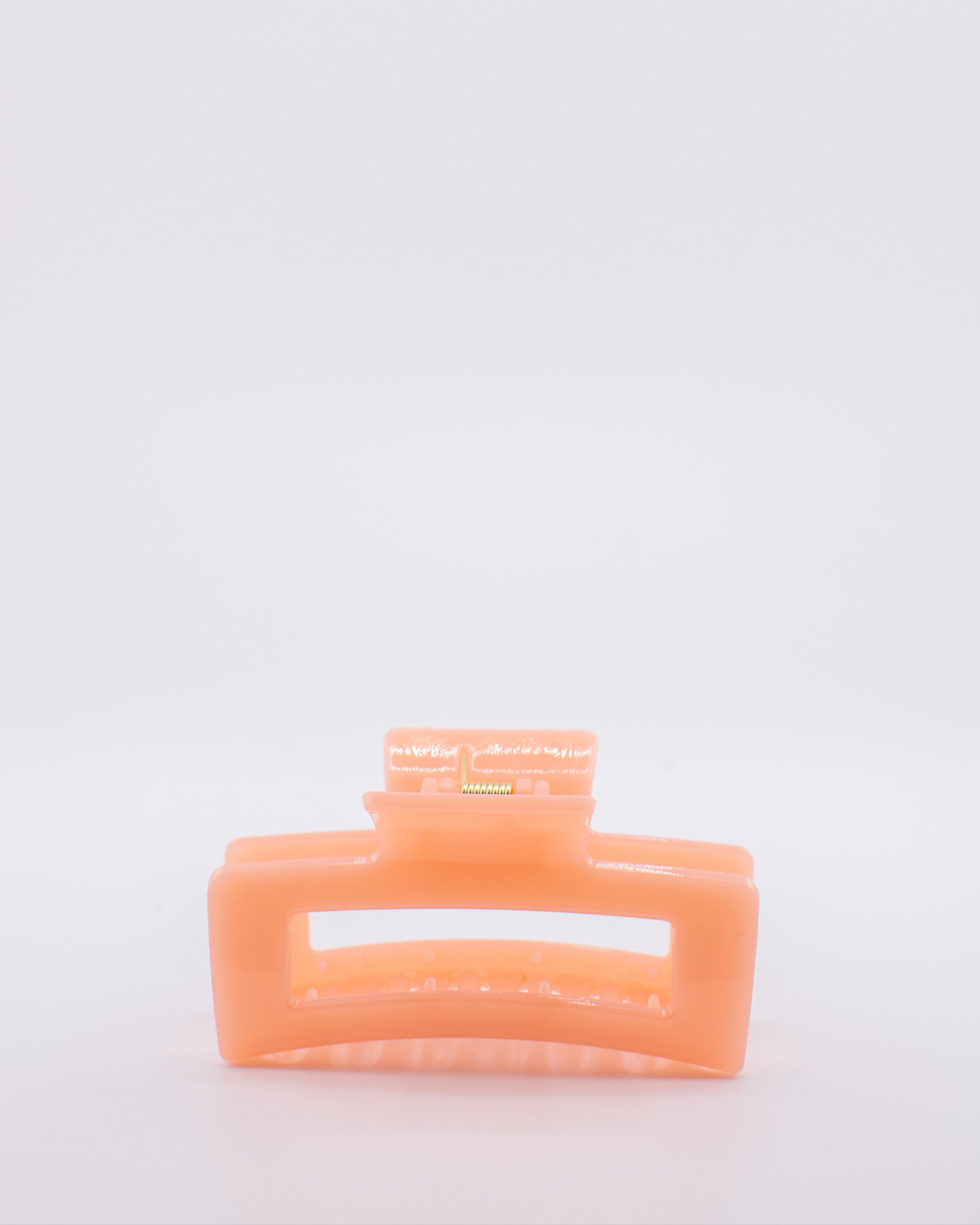 Orange hair clip on a 